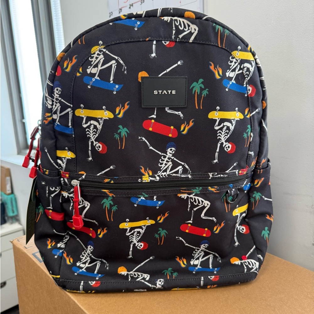 STATE Kids Backpack in Black with Multi-Color Skateboard Skeleton Print
